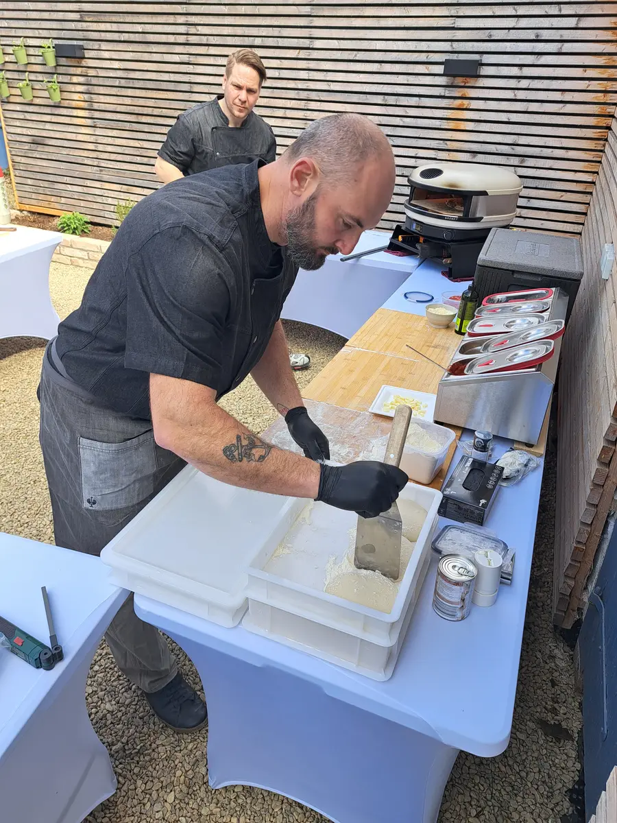 Pizzaiolo preparing dough
